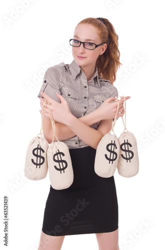 Photo: Young businesswoman with money sacks on white Young businesswoman with money sacks on white