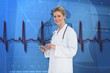 Composite image of blonde doctor using tablet pc Composite image of blonde doctor using tablet pc