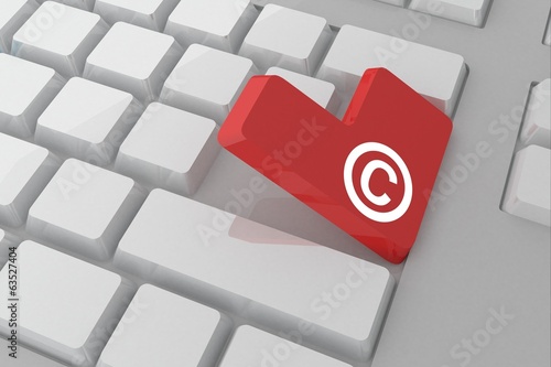 Illustration: Composite image of copyright symbol on key Composite image of copyright symbol on key