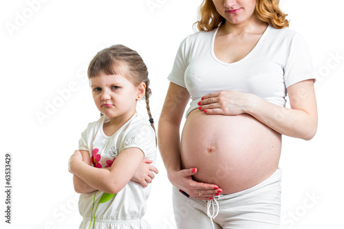 Photo: jealous kid and her pregnant mother jealous kid and her pregnant mother