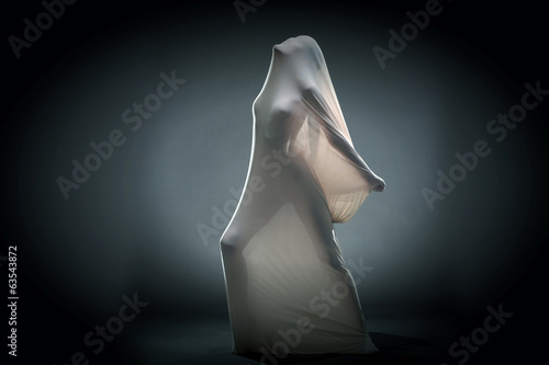 Photo: Screaming naked woman trying to escape from tissue Screaming naked woman trying to escape from tissue