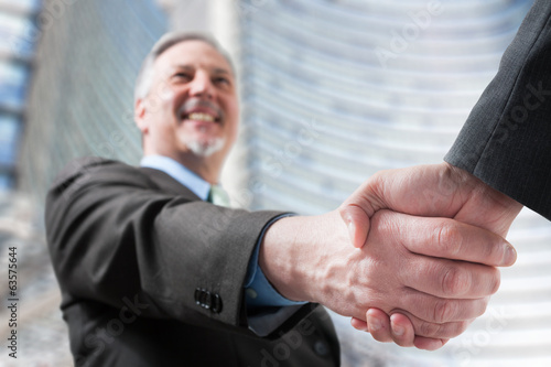 Photo: Businessmen shaking hands Businessmen shaking hands