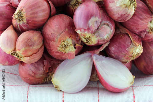 Photo: Closeup photo of Shallot bulbs cut in half Closeup photo of Shallot bulbs cut in half