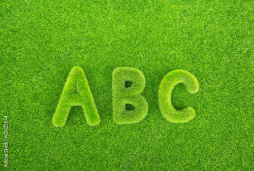 Photo: Alphabet letters ABC made from grass with grass background Alphabet letters ABC made from grass with grass background