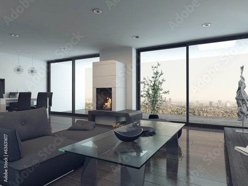 Photo: Modern living room interior with gray couch and fireplace Modern living room interior with gray couch and fireplace