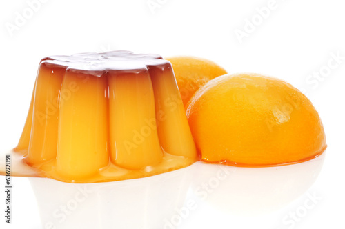 Photo: creme caramel and peach in syrup creme caramel and peach in syrup