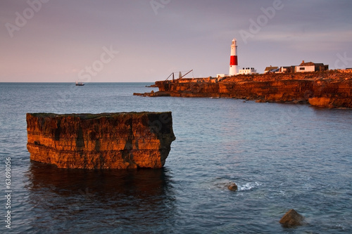 Photo: Portland Bill lighthouse on an early morning, Dorset, Uk. Portland Bill lighthouse on an early morning, Dorset, Uk.