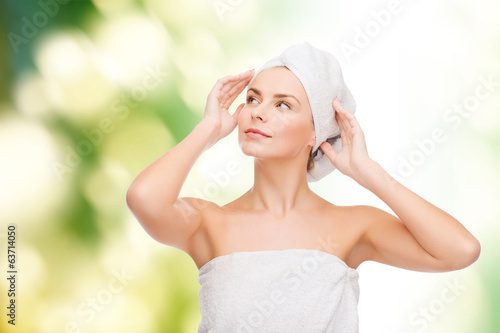 Photo: beautiful woman in towel beautiful woman in towel