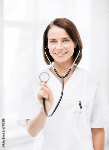 Photo: female doctor with stethoscope female doctor with stethoscope
