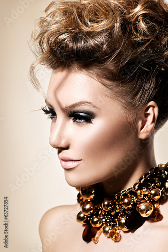 Photo: Beautiful model girl with perfect fashion makeup and hairstyle Beautiful model girl with perfect fashion makeup and hairstyle