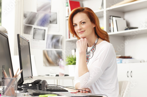 Photo: Portrait of beautiful modern businesswoman a Portrait of beautiful modern businesswoman a