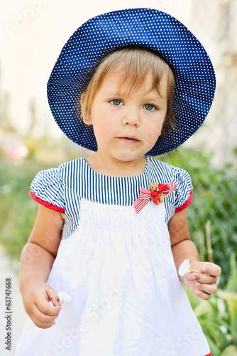 Photo: toddler with little flowers toddler with little flowers
