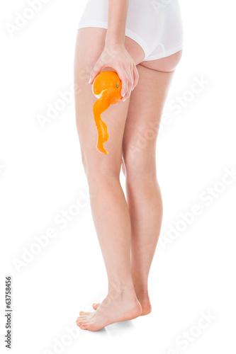 Photo: Woman Holding Orange Woman Holding Orange