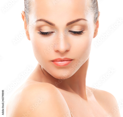 Photo: Beautiful Face of Young Woman with Clean Fresh Skin Beautiful Face of Young Woman with Clean Fresh Skin