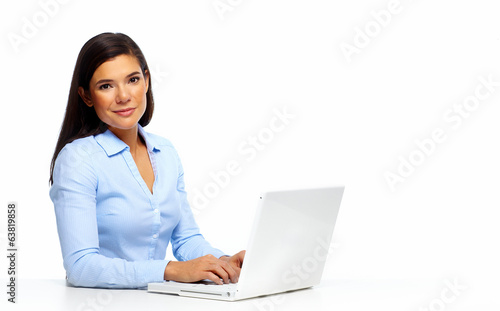 Photo: Business woman working with laptop. Business woman working with laptop.