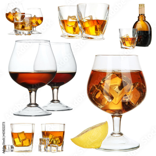 Photo: Collage of brandy glasses with ice cubes isolated on white Collage of brandy glasses with ice cubes isolated on white