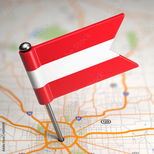 Illustration: Austria Small Flag on a Map Background. Austria Small Flag on a Map Background.