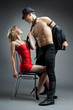 man show striptease for woman in red man show striptease for woman in red