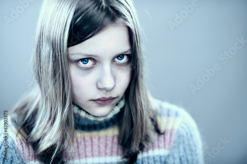 Photo: Portrait of a unhappy teen girl Portrait of a unhappy teen girl