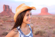 Cowgirl woman happy portrait in Monument Valley Cowgirl woman happy portrait in Monument Valley