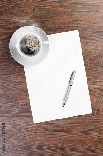 Photo: white coffee cup on blank white coffee cup on blank