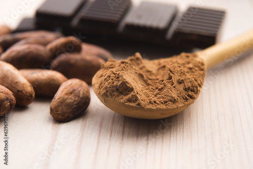 Photo: Cocoa (cacao) beans with chocolate Cocoa (cacao) beans with chocolate