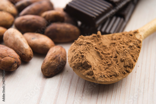 Photo: Cocoa (cacao) beans with chocolate Cocoa (cacao) beans with chocolate