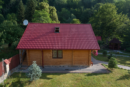 Photo: Small wooden house in Carpathian mountains, Western Ukraine Small wooden house in Carpathian mountains, Western Ukraine
