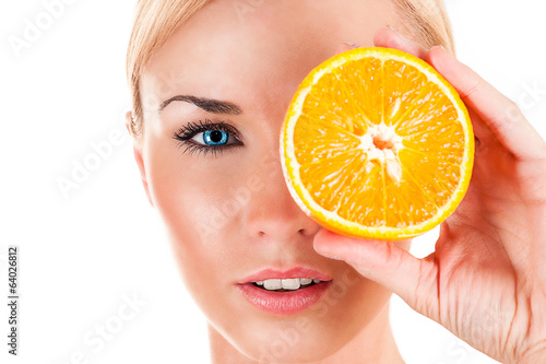 Photo: portrait of a beautiful woman with orange portrait of a beautiful woman with orange