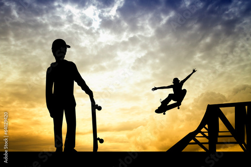 Illustration: skateboarder silhouette at sunset skateboarder silhouette at sunset