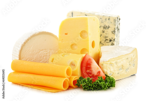 Photo: Different sorts of cheese isolated on white background Different sorts of cheese isolated on white background