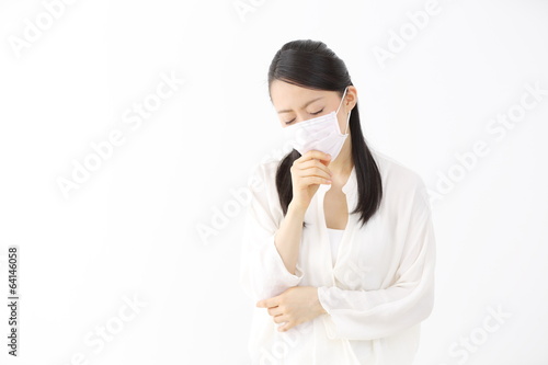 Photo: マスクをした女性 マスクをした女性