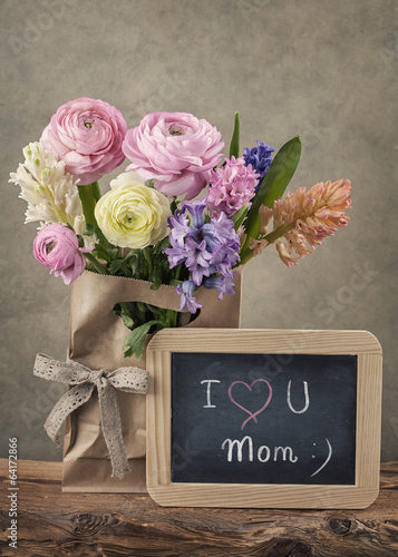 Photo: Flowers and a chalk board Flowers and a chalk board