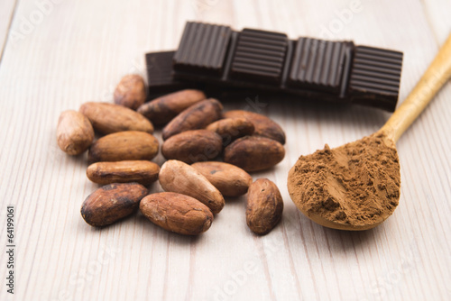 Photo: Cocoa (cacao) beans with chocolate Cocoa (cacao) beans with chocolate