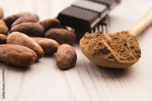 Photo: Cocoa (cacao) beans with chocolate Cocoa (cacao) beans with chocolate