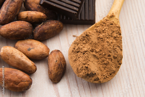 Photo: Cocoa (cacao) beans with chocolate Cocoa (cacao) beans with chocolate