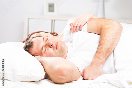 Photo: man sleeping in bed man sleeping in bed