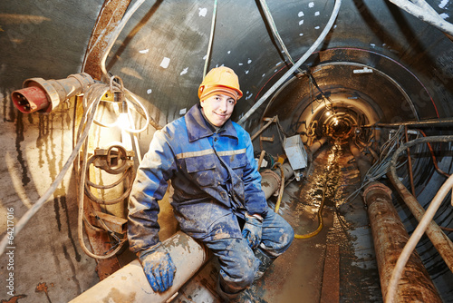 Photo: undeground working in tunnel undeground working in tunnel