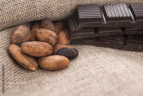 Photo: Cocoa (cacao) beans with chocolate Cocoa (cacao) beans with chocolate