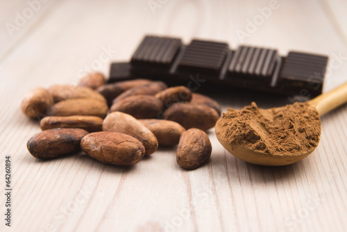 Photo: Cocoa (cacao) beans with chocolate Cocoa (cacao) beans with chocolate