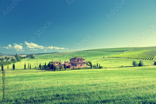 Photo: Tuscany landscape with typical farm house, Italty Tuscany landscape with typical farm house, Italty