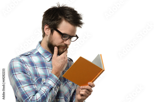 Photo: Young Man Reading Young Man Reading