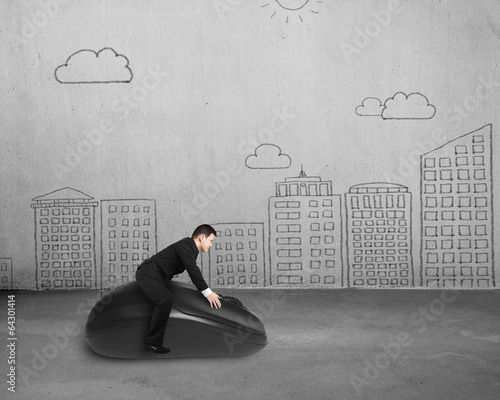 Photo: Riding computer mouse with cityscape doodles Riding computer mouse with cityscape doodles