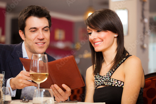 Photo: Couple having dinner in a restaurant Couple having dinner in a restaurant