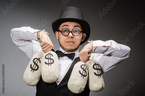 Photo: Man with sacks of money Man with sacks of money