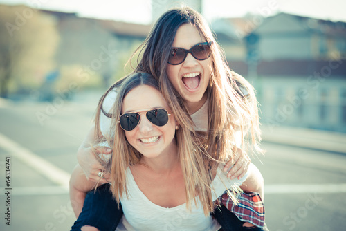 two beautiful young women having fun