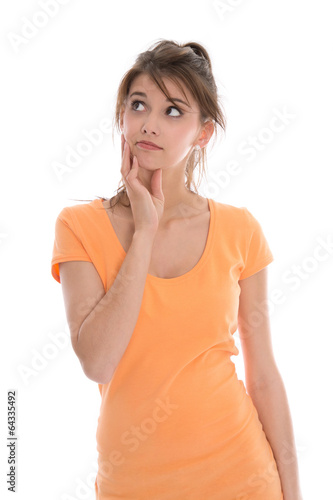 Photo: Skeptische junge Frau in Shirt orange freigestellt Skeptische junge Frau in Shirt orange freigestellt