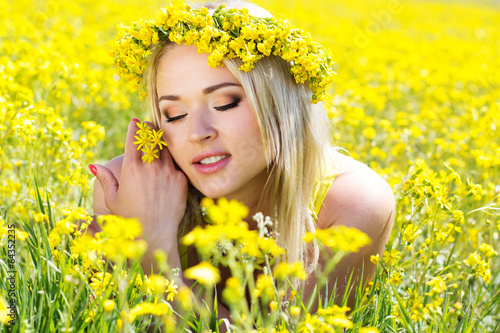 Photo: Young beautiful girl in the yellow field Young beautiful girl in the yellow field