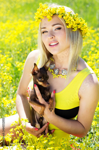 Photo: Pretty girl on the nature with her dog Pretty girl on the nature with her dog