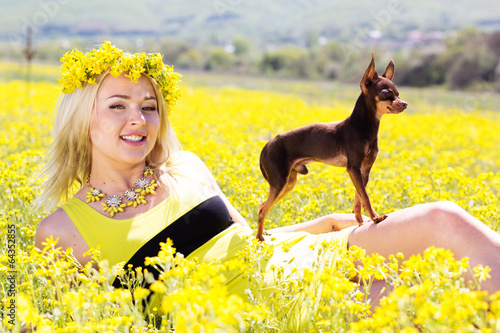 Photo: Pretty girl on the nature with her dog Pretty girl on the nature with her dog